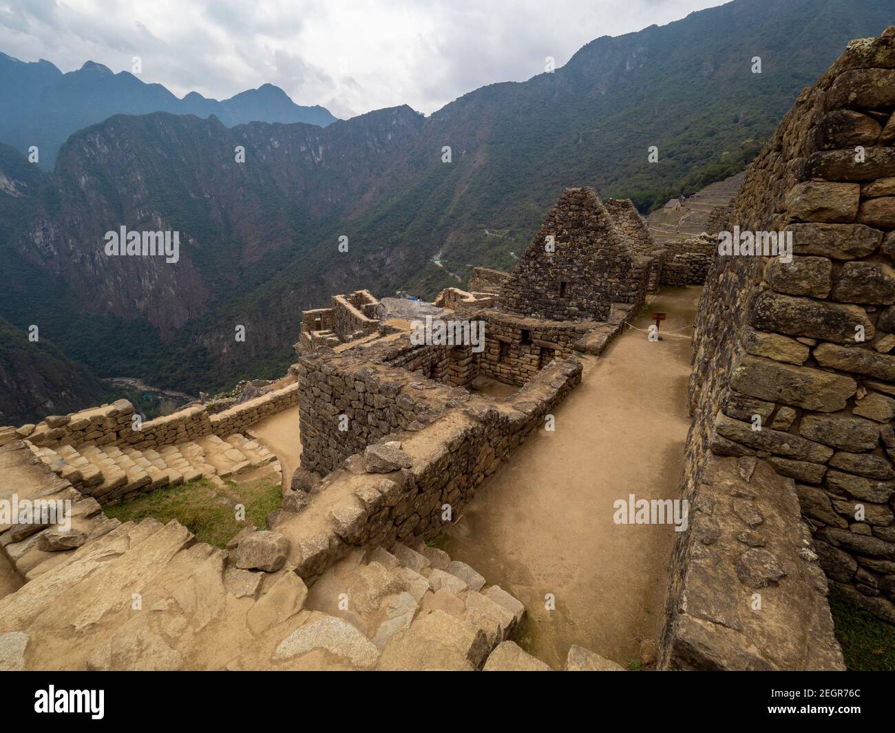 Machu Picchu Stone walls and andes mountain range on the bacground ...