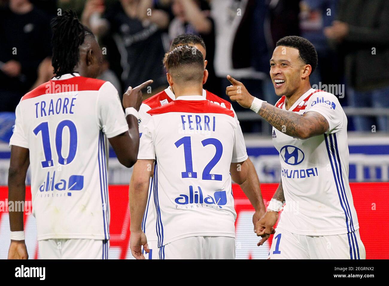 Soccer Football - Ligue 1 - Olympique Lyonnais vs OGC Nice - Groupama  Stadium, Lyon, France - May 19, 2018 Lyon's Memphis Depay celebrates  scoring their third goal and completing his hat-trick