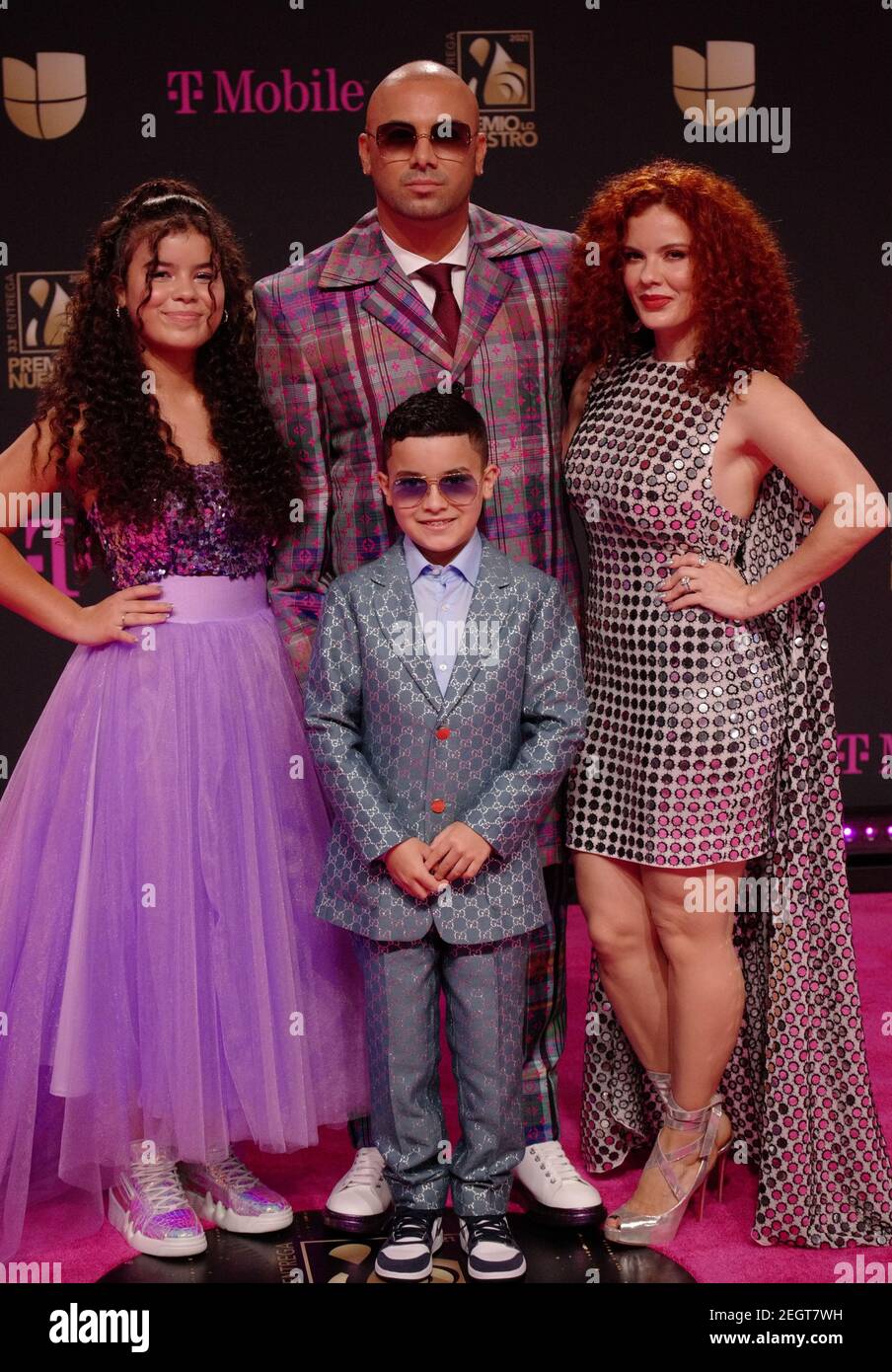 Miami, United States. 18th Feb, 2021. Wisin, Dylan Morera Ortiz, Yomaira Ortiz Feliciano, and Yelena Morera Ortiz walk the red carpet at the 33 edition of Univision 2021 Premio Lo Nuestro award show at the American Airlines Arena in Miami, Florida, Thursday, February 18, 2021. Photo by Gary I Rothstein/UPI Credit: UPI/Alamy Live News Stock Photo