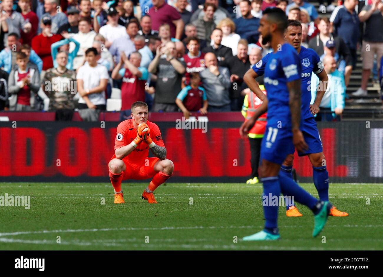 Soccer Football - Premier League - West Ham United vs Everton - London Stadium, London, Britain - May 13, 2018   Everton's Jordan Pickford reacts after conceding their third goal scored by West Ham United's Manuel Lanzini    REUTERS/Eddie Keogh    EDITORIAL USE ONLY. No use with unauthorized audio, video, data, fixture lists, club/league logos or 'live' services. Online in-match use limited to 75 images, no video emulation. No use in betting, games or single club/league/player publications.  Please contact your account representative for further details. Stock Photo