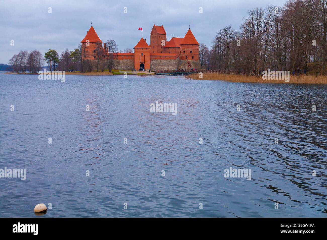The castle is located on an island in the middle of a beautiful lake ...