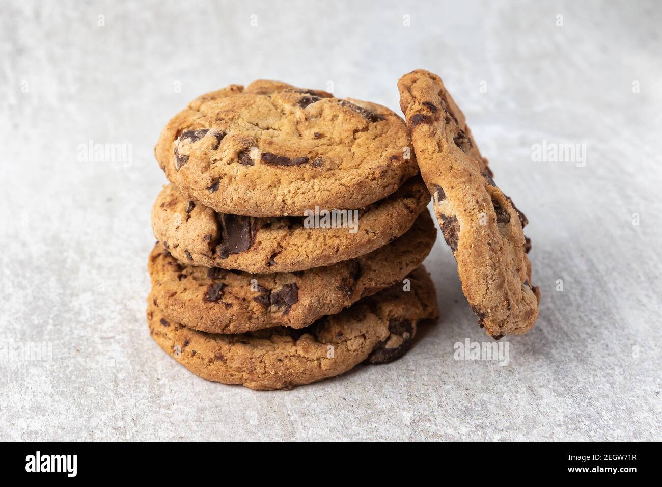 Cookies stacked with a light colored background Stock Photo