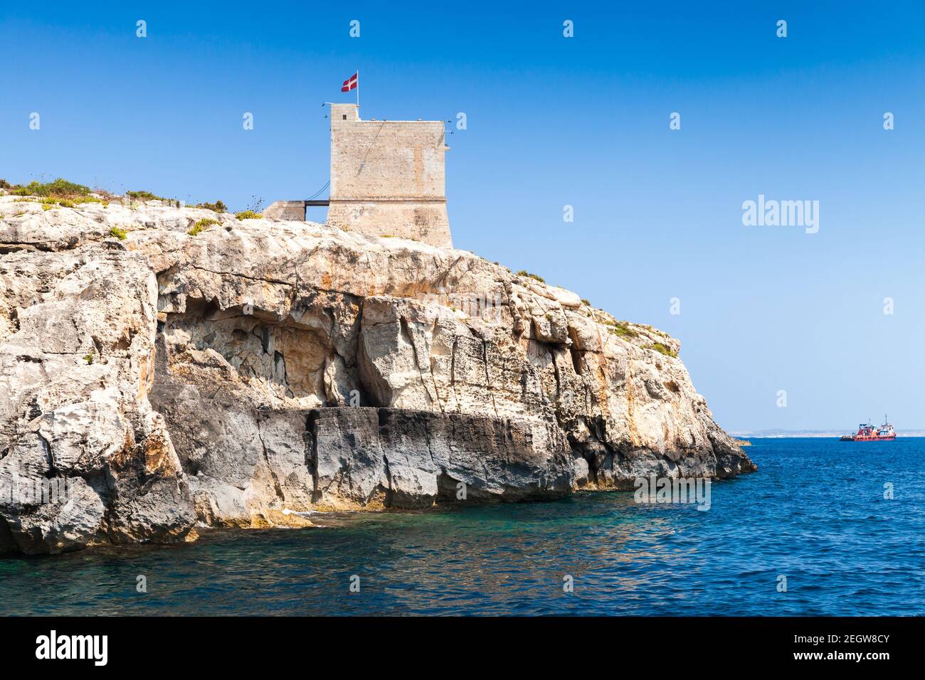 Coastal landscape with Mgarr ix-Xini Tower, the largest of the coastal watchtowers that the Knights of Malta erected on the island of Gozo Stock Photo