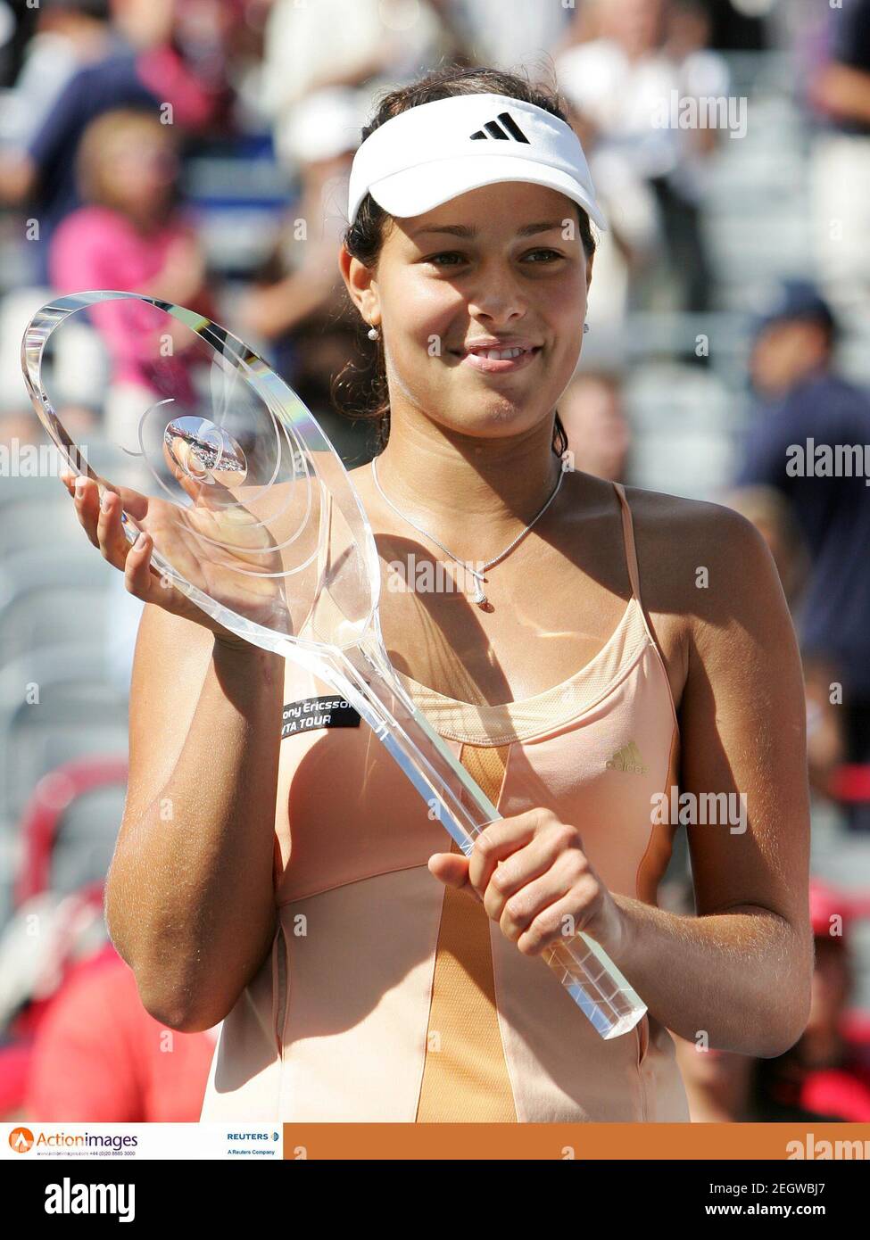Tennis - Rogers Cup, Sony Ericsson WTA Tour - Montreal, Canada - 21/8/06  Ana Ivanovic of Serbia celebrates with her trophy after defeating Martina Hingis of Switzerland in the finals at the Rogers Cup, Sony Ericsson WTA Tour  Mandatory Credit: Action Images / Chris Wattie  Livepic Stock Photo