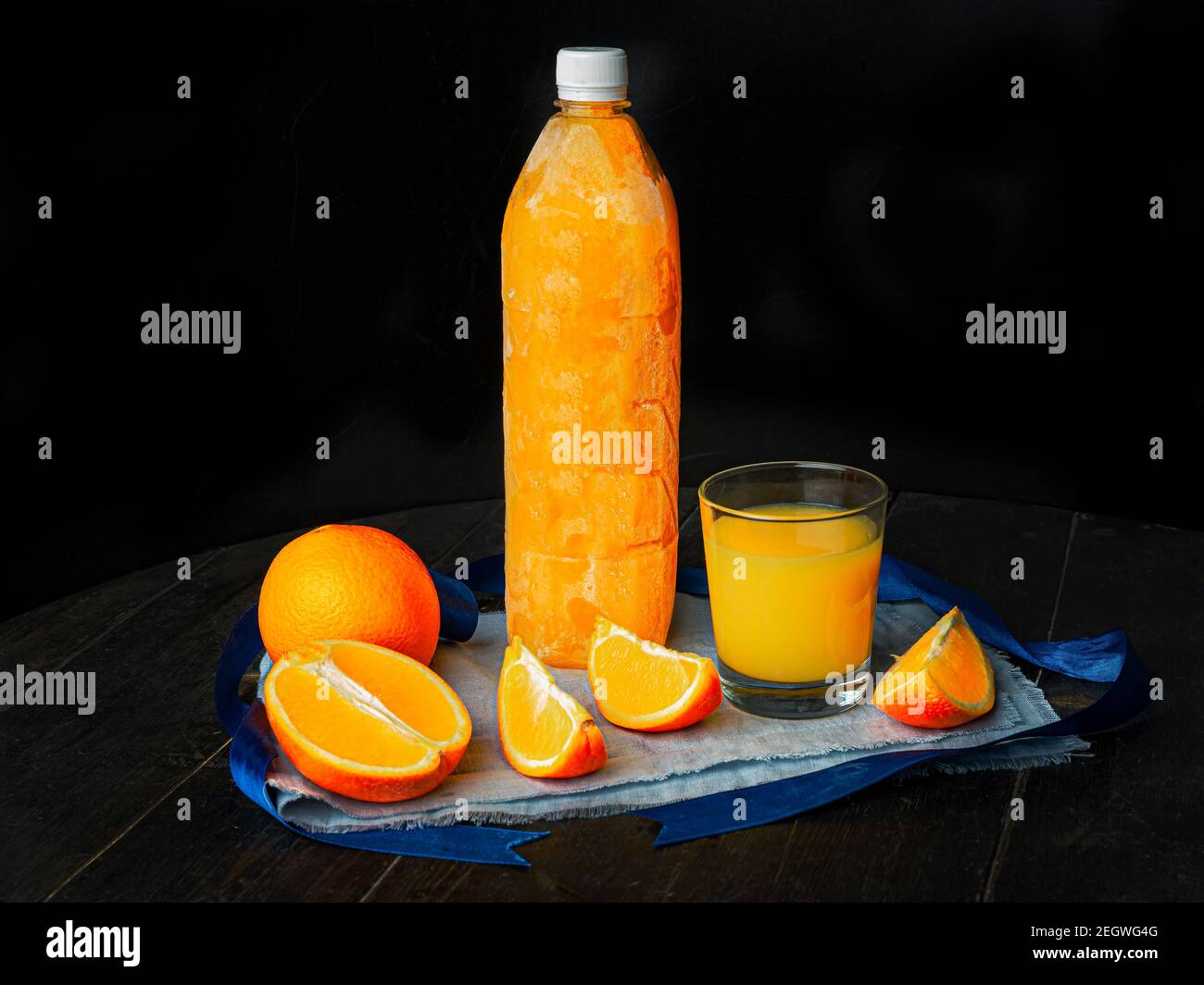 Orange juice bottle ice cold. Ice Fresh orange juice frozen Stock Photo Alamy