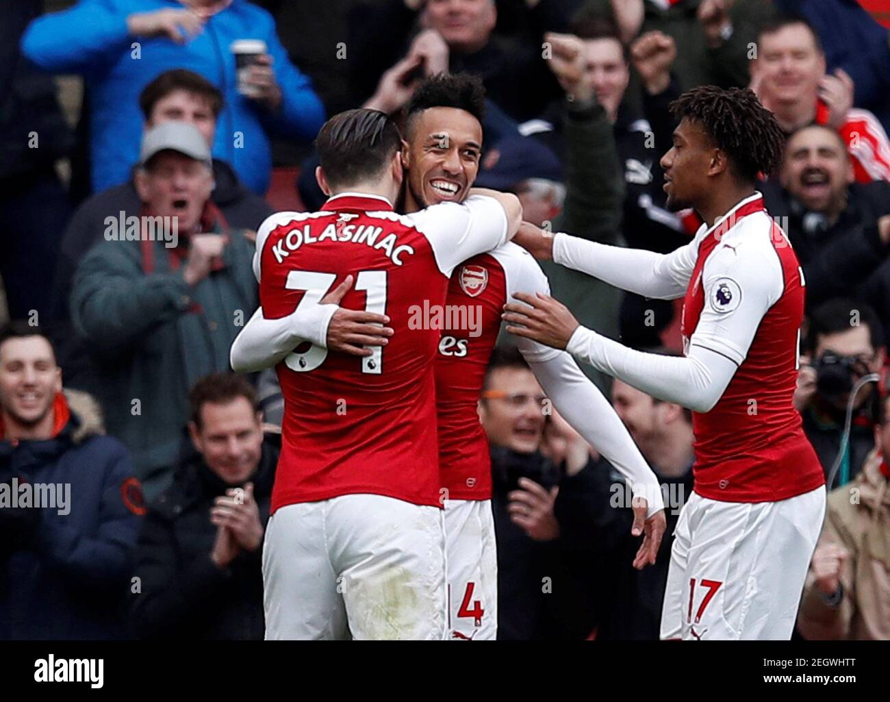 Soccer Football - Premier League - Arsenal vs Watford - Emirates Stadium, London, Britain - March 11, 2018 Arsenal's Pierre-Emerick Aubameyang celebrates scoring their second goal with team mates REUTERS/Eddie Keogh EDITORIAL USE ONLY. No use with unauthorized audio, video, data, fixture lists, club/league logos or "live" services. Online in-match use limited to 75 images, no video emulation. No use in betting, games or single club/league/player publications. Please contact your account representative for further details. Stock Photo