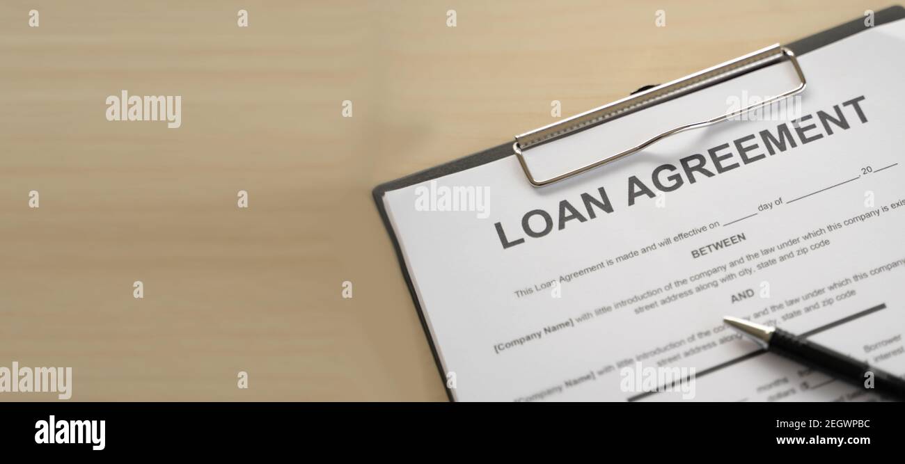 Loan pay man calculator spending monthly home loan documents, invoices,travelling,credit card, insurance Stock Photo