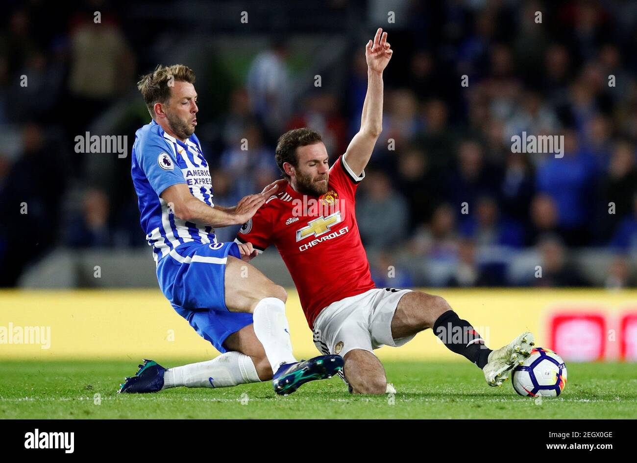 Soccer Football - Premier League - Brighton & Hove Albion v Manchester United - The American Express Community Stadium, Brighton, Britain - May 4, 2018   Manchester United's Juan Mata in action with Brighton's Dale Stephens    REUTERS/Eddie Keogh    EDITORIAL USE ONLY. No use with unauthorized audio, video, data, fixture lists, club/league logos or 'live' services. Online in-match use limited to 75 images, no video emulation. No use in betting, games or single club/league/player publications.  Please contact your account representative for further details. Stock Photo