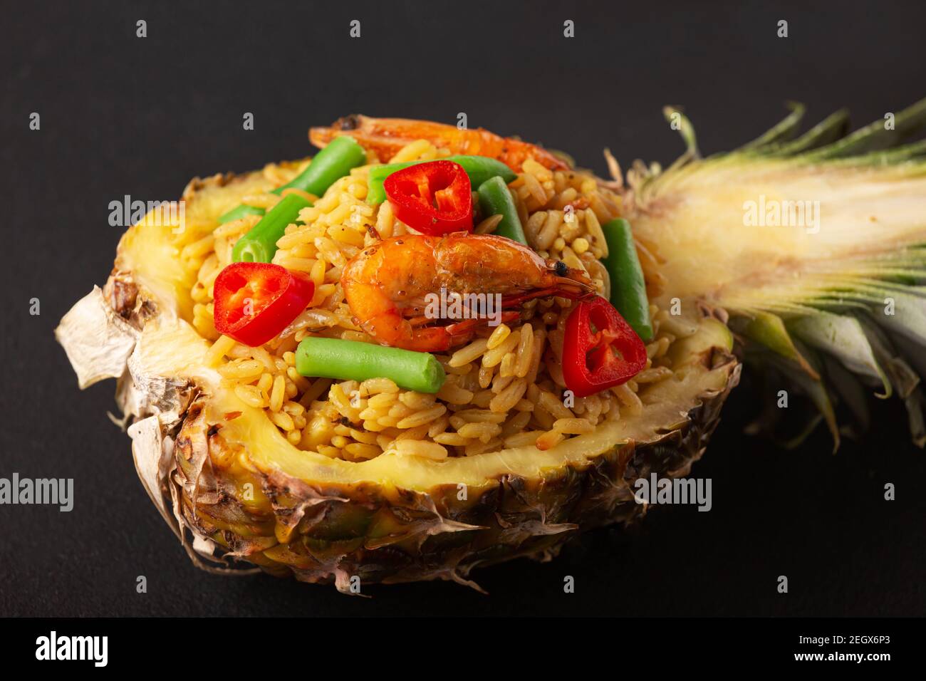 Stuffed pineapple thai cuisine on black background Stock Photo Alamy