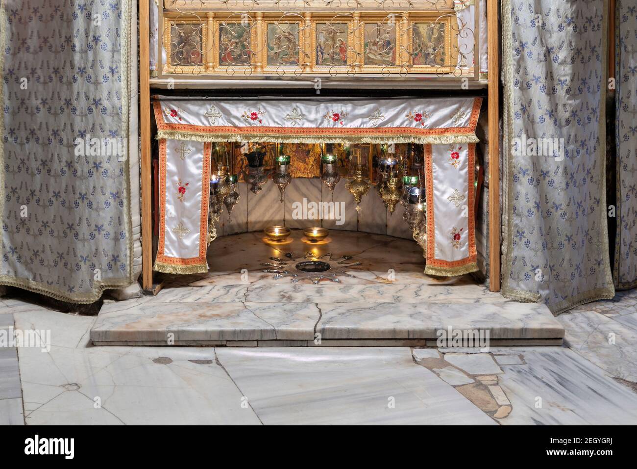 Church of the nativity, the star that indicates the site where Jesus Christ was born, Bethlehem, Palestine Stock Photo