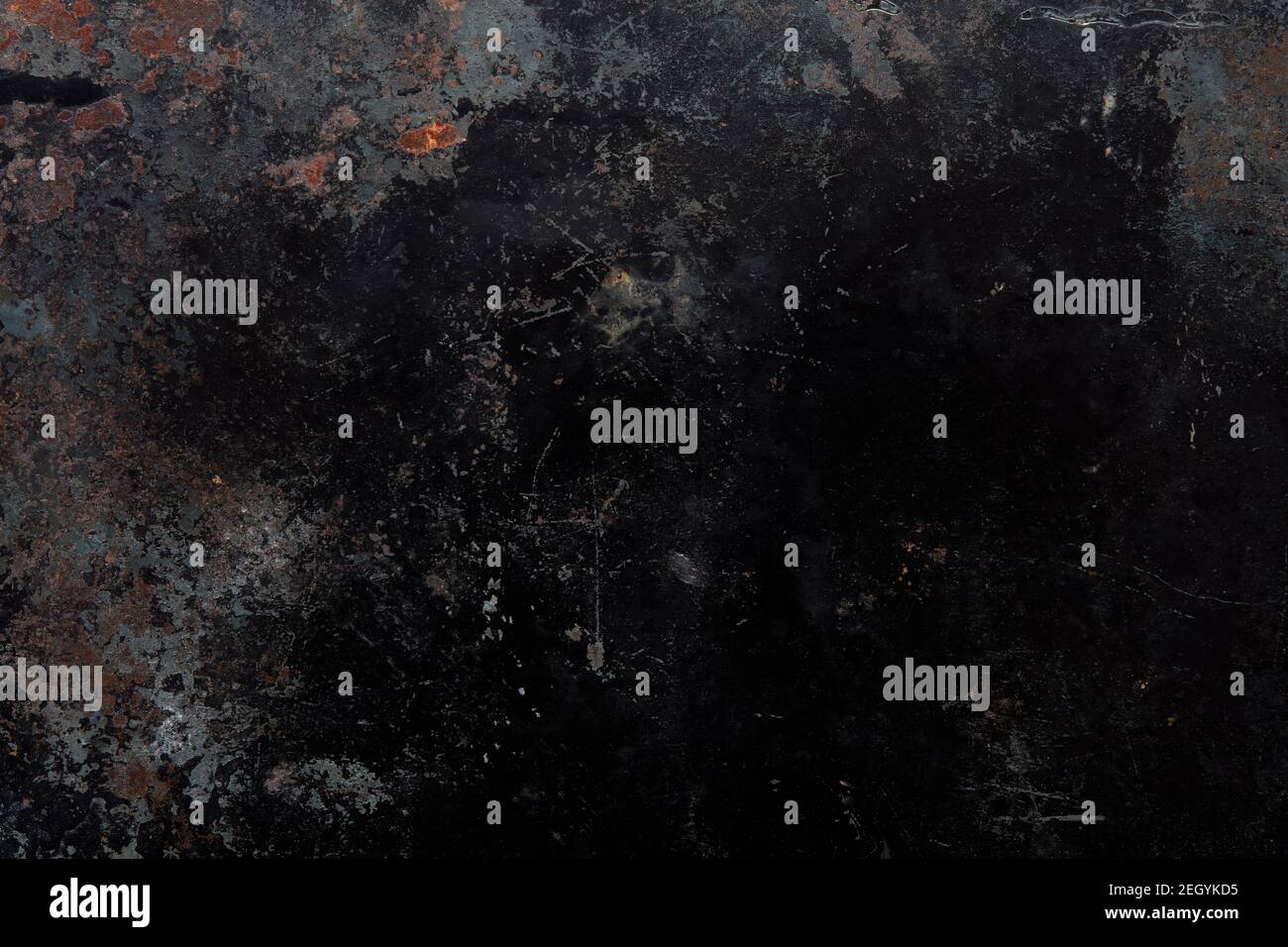 Black, corroded metal texture background with rusty parts Stock Photo