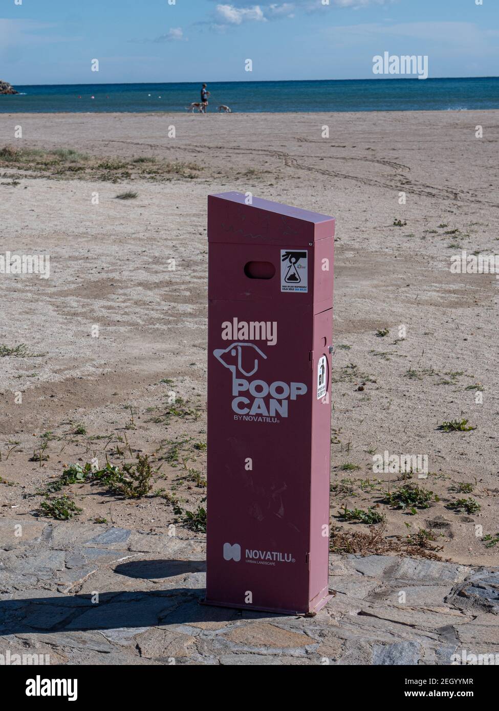 Dog waste bin on a beach in Andalucia Spain Stock Photo
