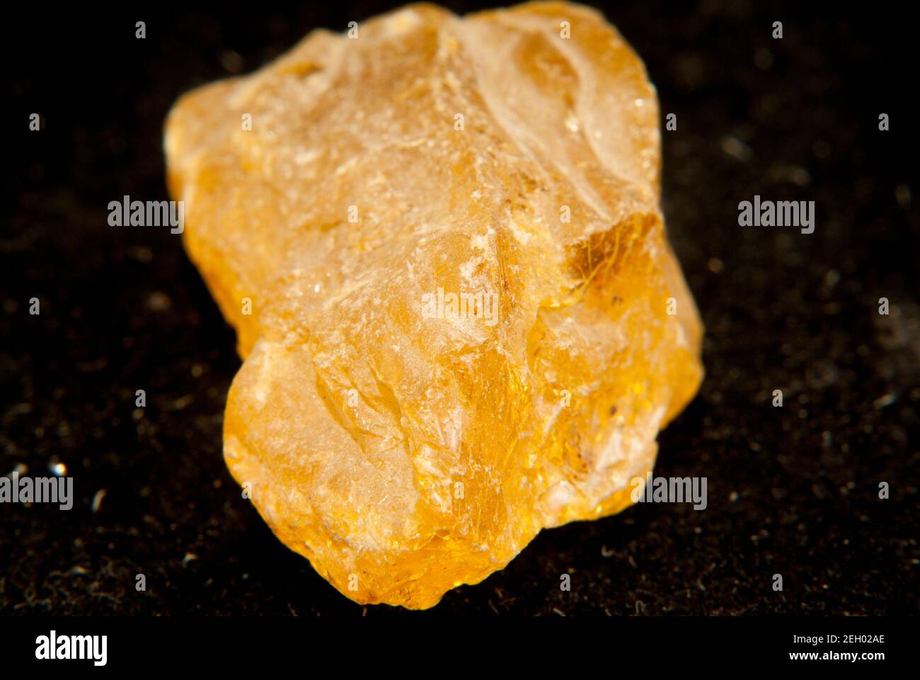 Closeup shot of Copaline mineral isolated on a black background Stock Photo