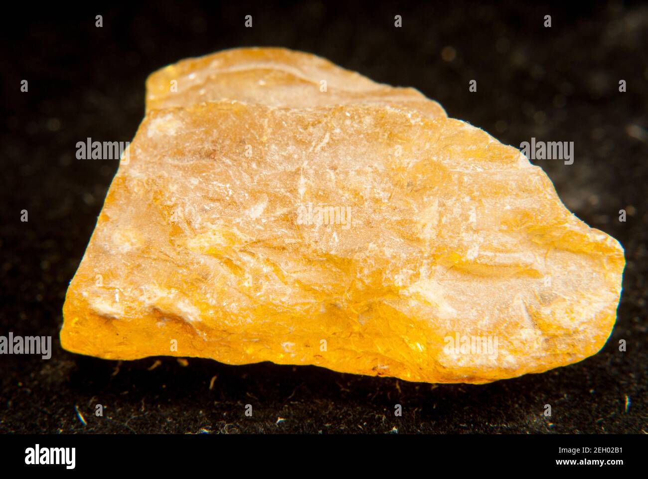 Closeup shot of Copaline mineral isolated on a black background Stock Photo