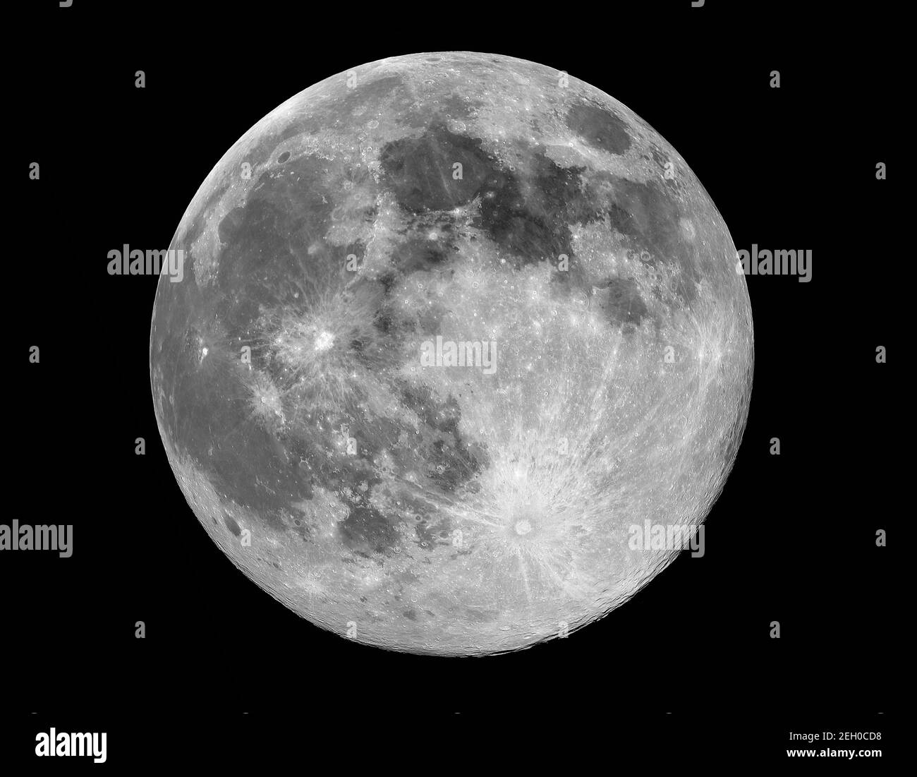 Full Moon with crater detail against black background. Stock Photo