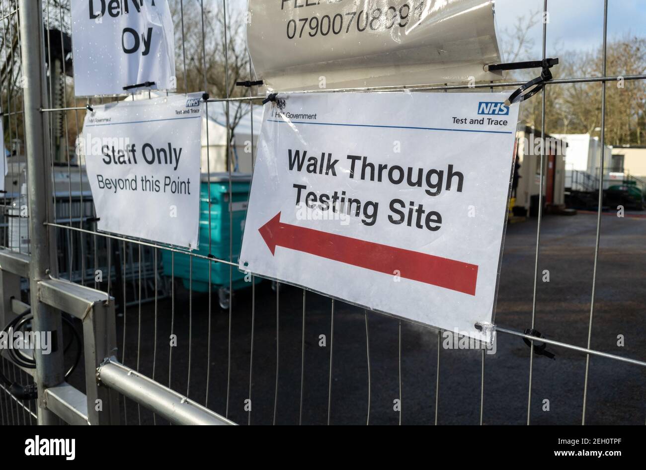A walk through Covid-19 testing site with a notice pointing towards the entrance. Stock Photo