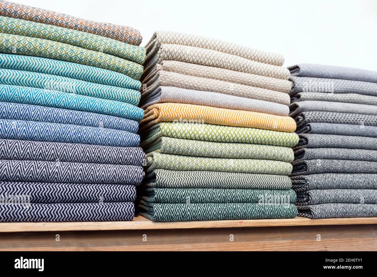 stacks of colorful fabrics Stock Photo