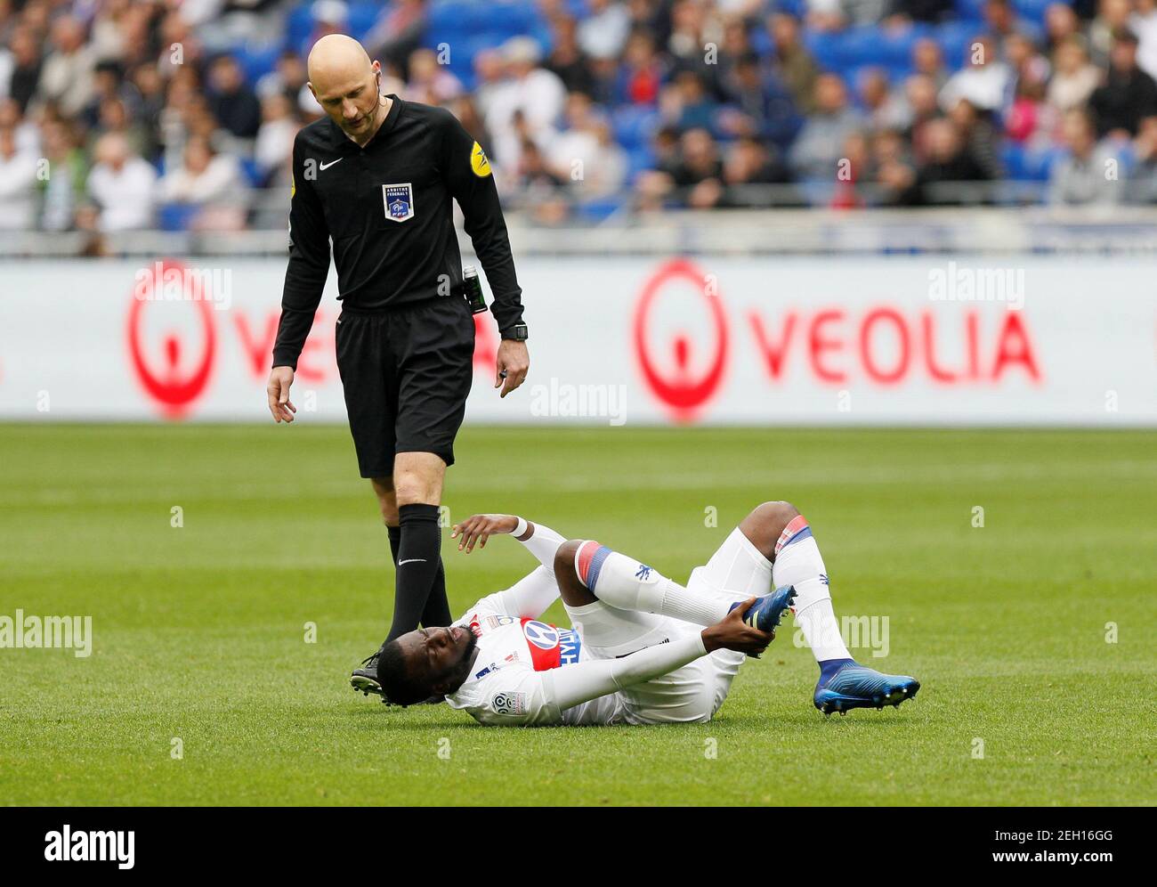 Soccer Football Ligue 1 Olympique Lyonnais V Fc Nantes Groupama Stadium Lyon France April 28 2018 Lyon S Tanguy Ndombele After Sustaining An Injury Reuters Emmanuel Foudrot Stock Photo Alamy