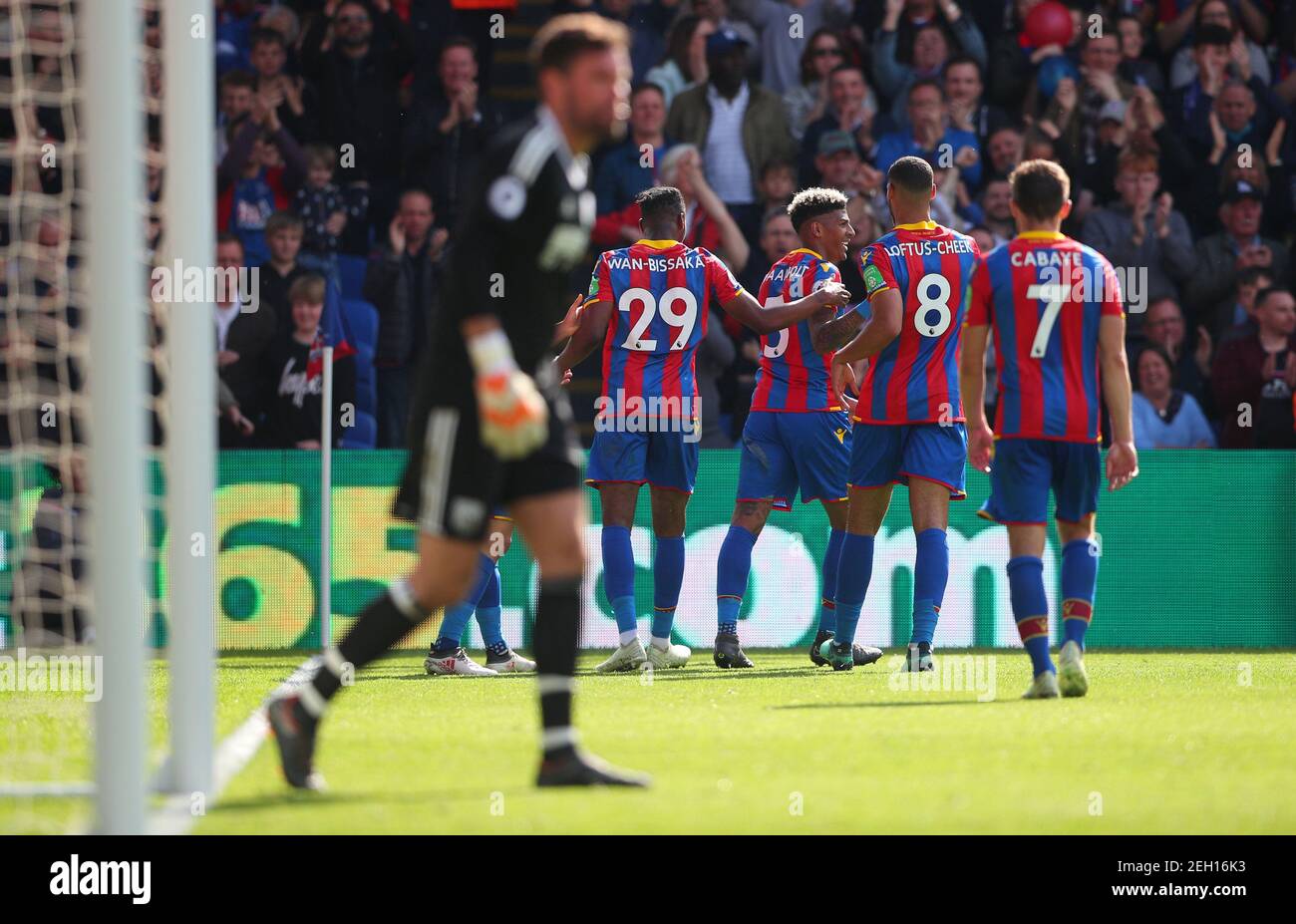 Soccer Football - Premier League - Crystal Palace vs West Bromwich Albion - Selhurst Park, London, Britain - May 13, 2018 Crystal Palace's Patrick van Aanholt celebrates scoring their second goal with team mates REUTERS/Hannah McKay EDITORIAL USE ONLY. No use with unauthorized audio, video, data, fixture lists, club/league logos or "live" services. Online in-match use limited to 75 images, no video emulation. No use in betting, games or single club/league/player publications. Please contact your account representative for further details. Stock Photo