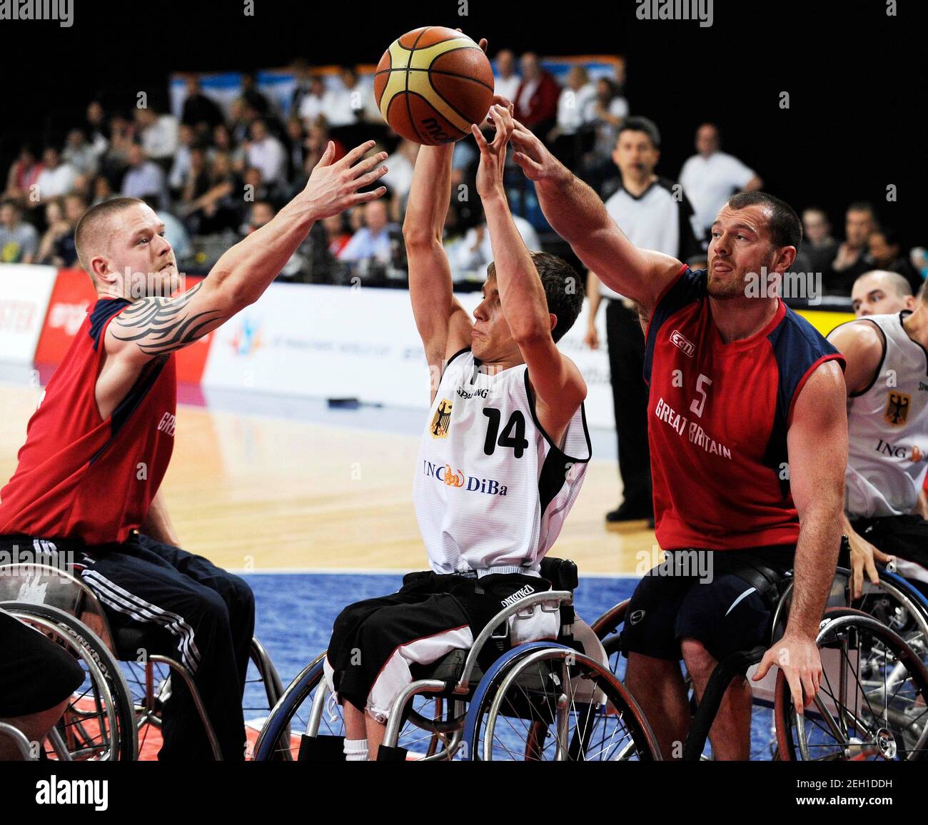 Wheelchair Basketball - Great Britain v Germany Mens Third Place Play Off -  BT Paralympic World Cup - Manchester - 23/5/09 Germany's Thomas Bohmeis is  blocked by Joe Bestwick and Dan Highcock