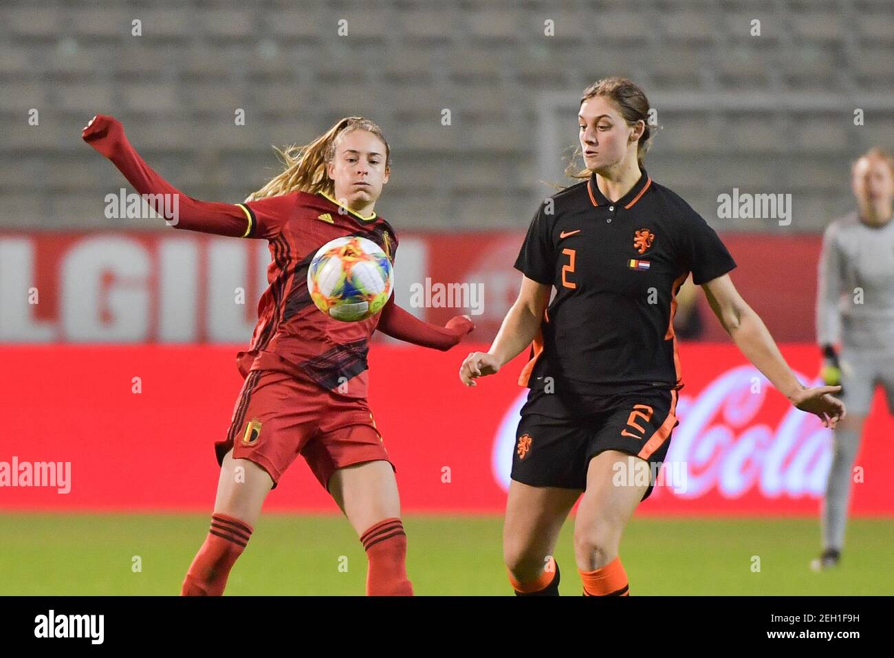 Brussels, Belgium. 18th Feb, 2021. Tessa Wullaert (9) of Belgium and Aniek Nouwen (2) of The Netherlands pictured during a friendly female soccer game between the national teams of Belgium, called the Red Flames and The Netherlands, called the Oranje Leeuwinnen in a pre - bid tournament called Three Nations One Goal with the national teams from Belgium, The Netherlands and Germany towards a bid for the hosting of the 2027 FIFA Women's World Cup, on Thursday 18 th of February 2021 in Brussels, Belgium . PHOTO SPORTPIX.BE | SPP | DIRK VUYLSTEKE Credit: SPP Sport Press Photo. /Alamy Live News Stock Photo