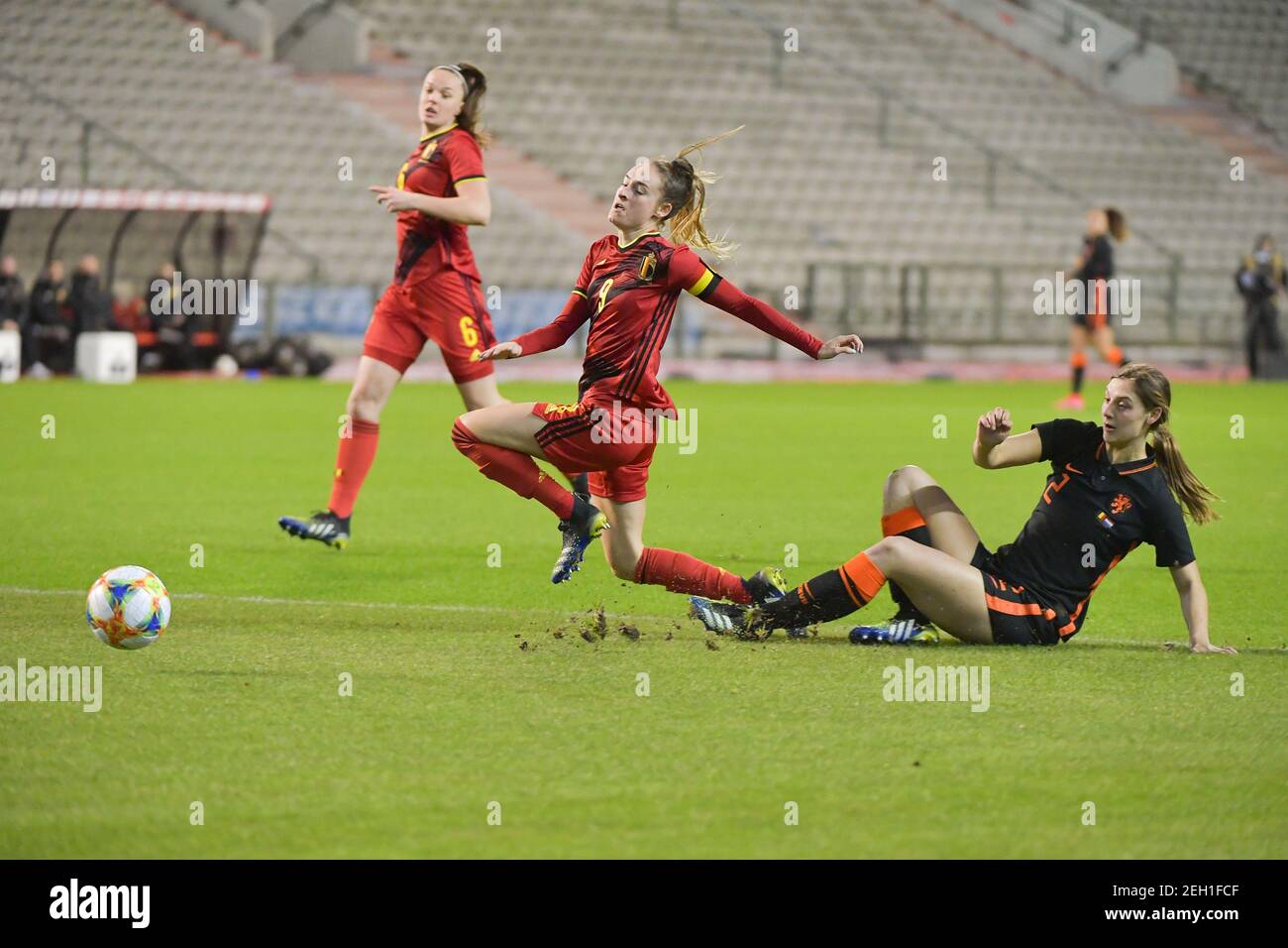 Brussels, Belgium. 18th Feb, 2021. Tessa Wullaert (9) of Belgium and Aniek Nouwen (2) of The Netherlands pictured during a friendly female soccer game between the national teams of Belgium, called the Red Flames and The Netherlands, called the Oranje Leeuwinnen in a pre - bid tournament called Three Nations One Goal with the national teams from Belgium, The Netherlands and Germany towards a bid for the hosting of the 2027 FIFA Women's World Cup, on Thursday 18 th of February 2021 in Brussels, Belgium . PHOTO SPORTPIX.BE | SPP | DIRK VUYLSTEKE Credit: SPP Sport Press Photo. /Alamy Live News Stock Photo