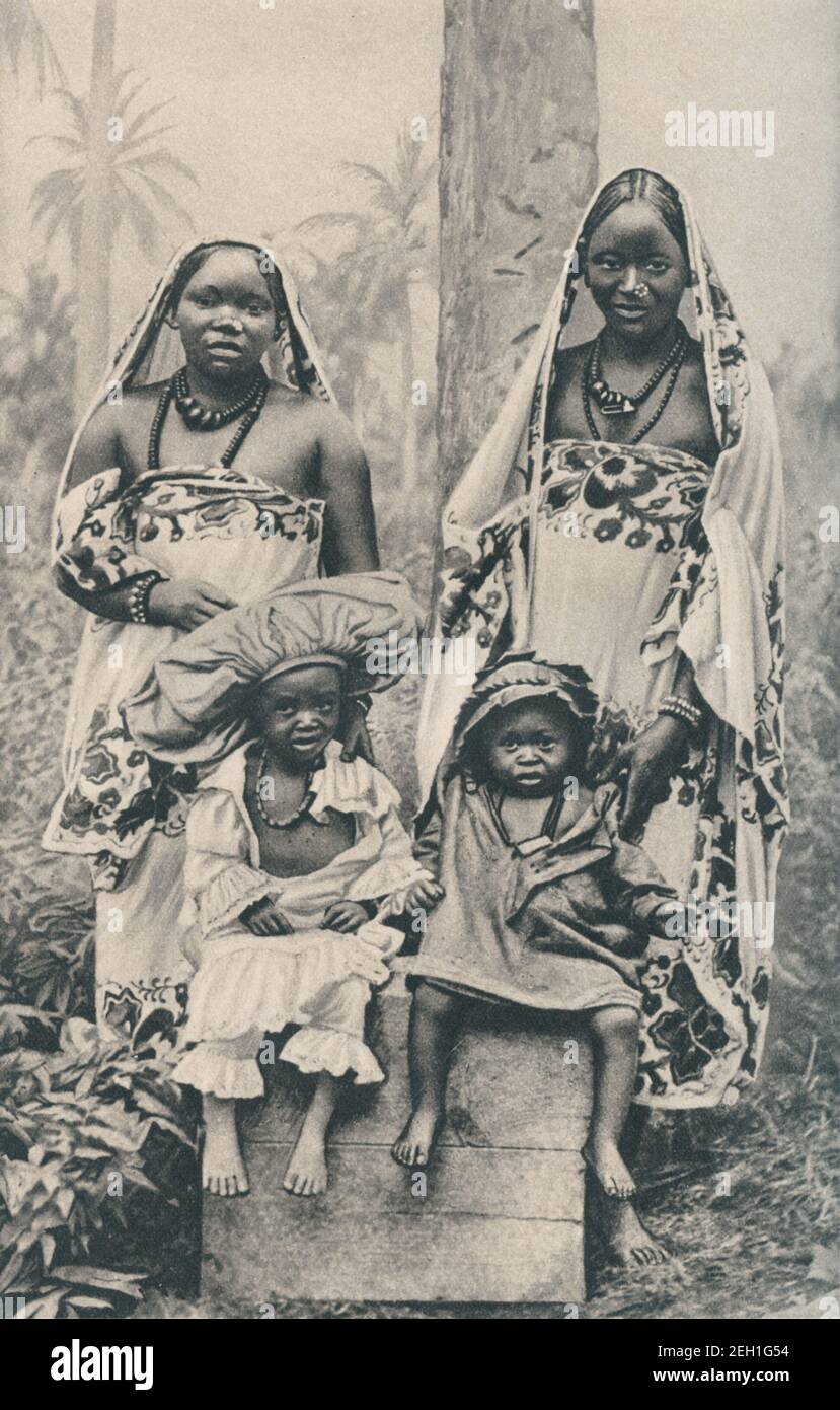 An early 20th century photo of a group of Swahili women and their children from East Africa circa early 1900s Stock Photo
