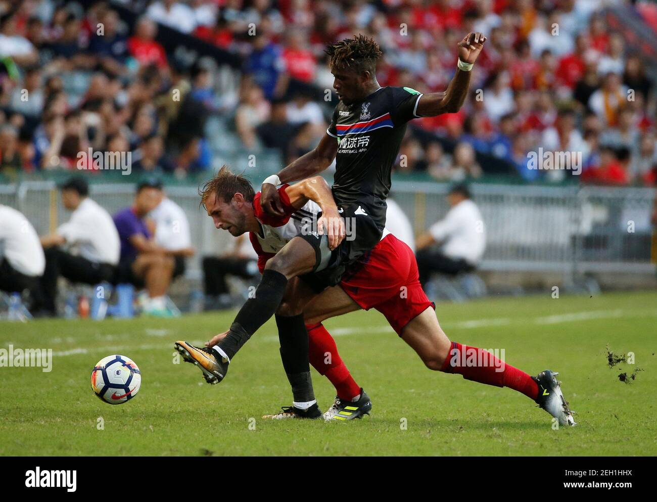 Soccer Football - West Bromwich Albion v Crystal Palace - Pre Season Friendly - The Premier League Asia Trophy - Third-place play-off - June 22, 2017   Crystal Palace's Wilfried Zaha in action with West Bromwich Albion's Craig Dawson    REUTERS/BOBBY YIP Stock Photo
