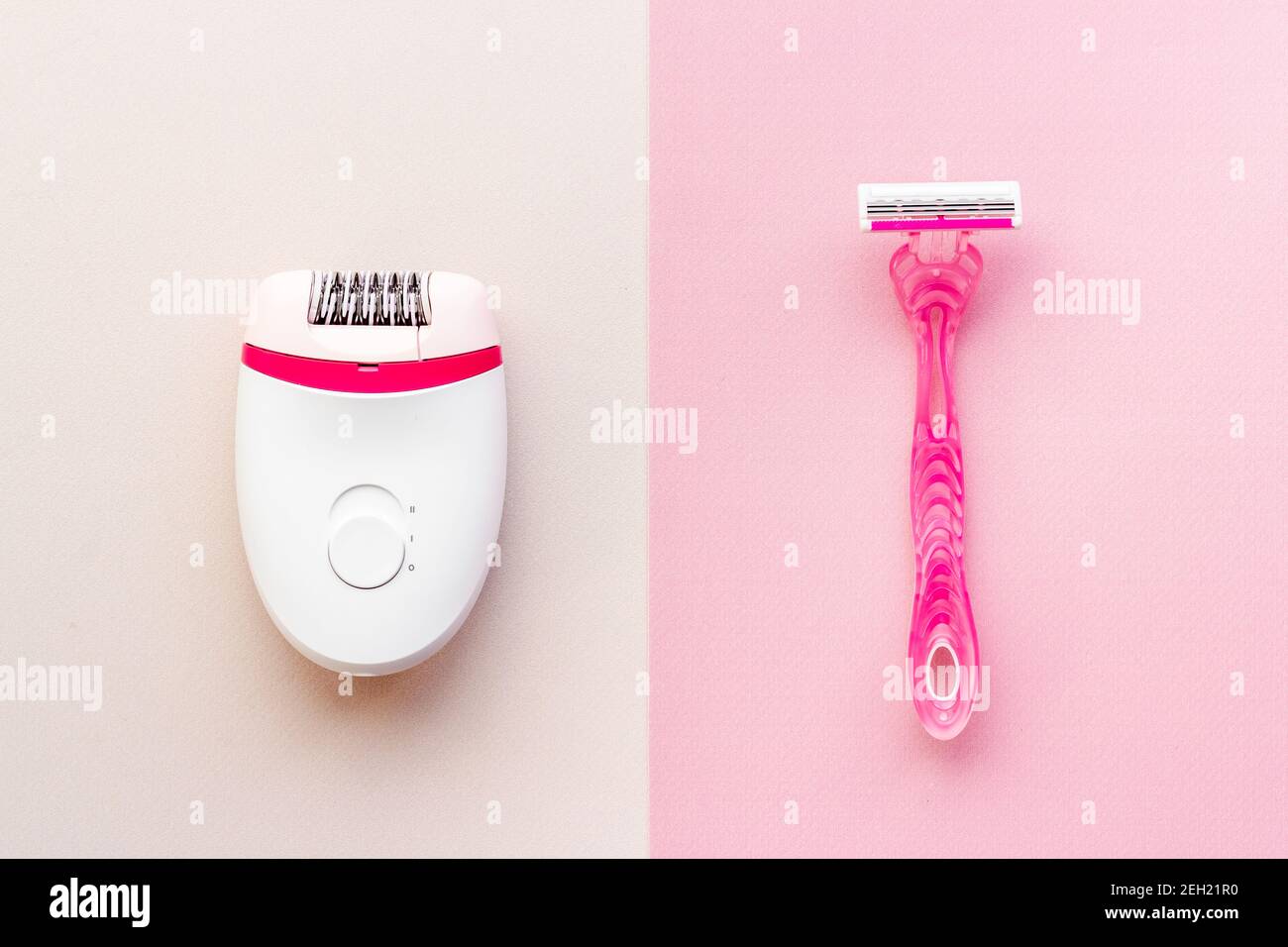 White epilator with pink razor. Epilation concept, removal of unwanted