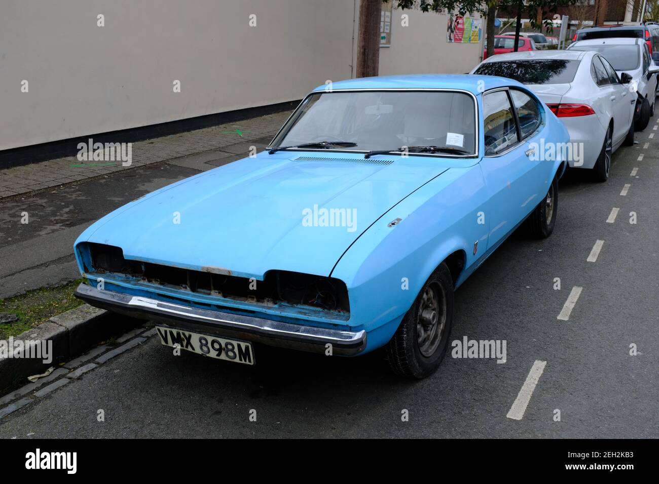 FOREST GATE, LONDON - 19TH FEBRUARY 2021: A light blue Ford Capri classic car parked up on the street. Stock Photo