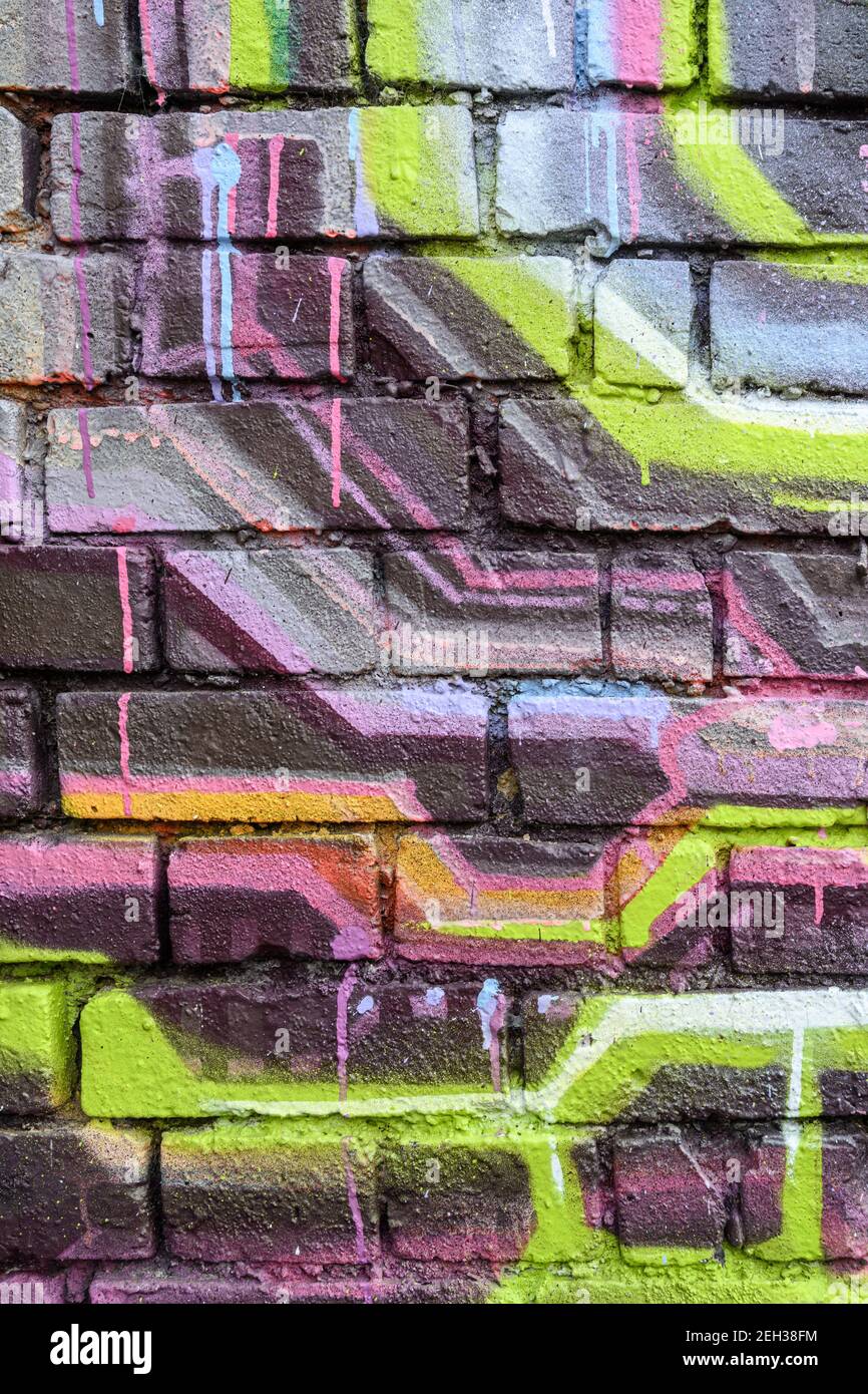 Spray painted brick wall detail Stock Photo Alamy