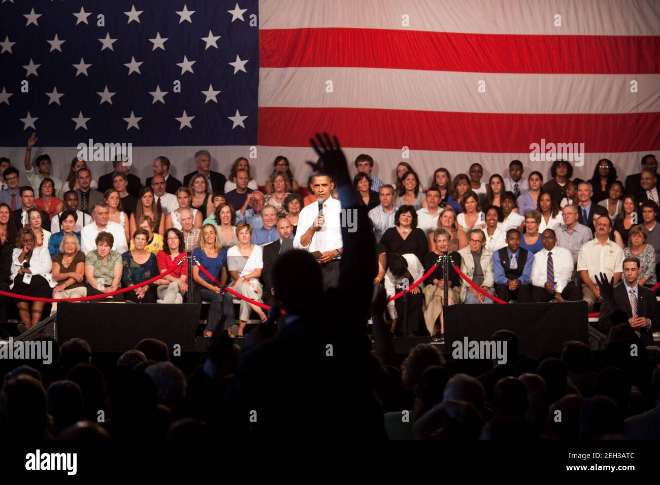 President Barack Obama answers questions during a health care town hall meeting at Shaker Heights High School in Cleveland, Ohio, July 23, 2009. Stock Photo