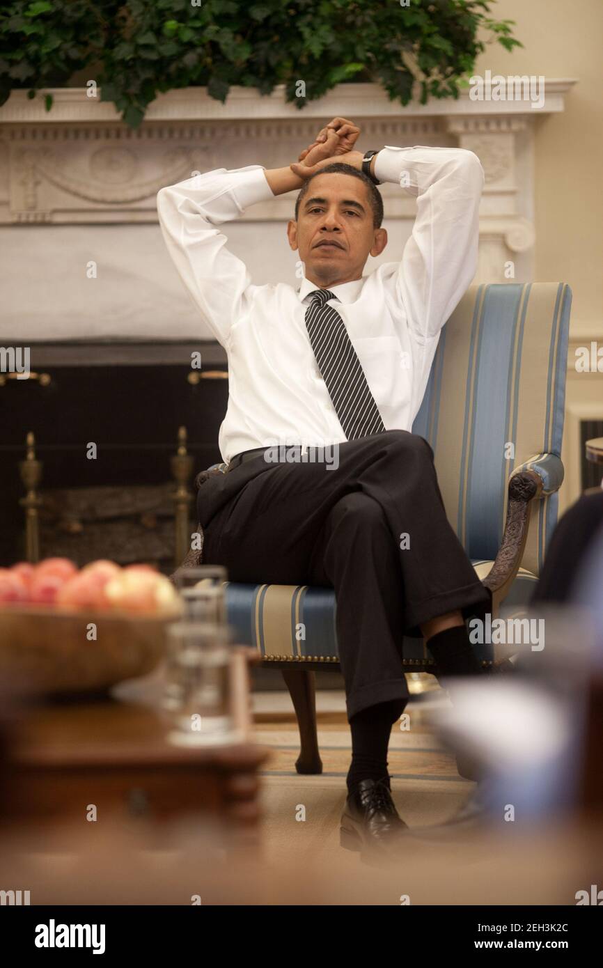 President Barack Obama listens during the daily economic briefing in ...