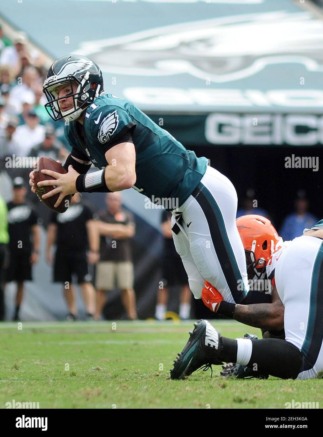 Philadelphia, United States. 11th Sep, 2016. FILE PHOTO: In this September 11, 2016 file photo, Philadelphia Eagles quarterback Carson Wentz is tackled by a Cleveland Browns defender, September 11, 2016 at Lincoln Financial Field in Philadelphia, Pennsylvania. Wentz was traded February 18, 2021, for a second and third round draft pick, to the Indianapolis Colts, reuniting him with Colts head coach and former Philadelphia Eagles offensive coordinator, Frank Reich. ( Credit: William Thomas Cain/Alamy Live News Stock Photo