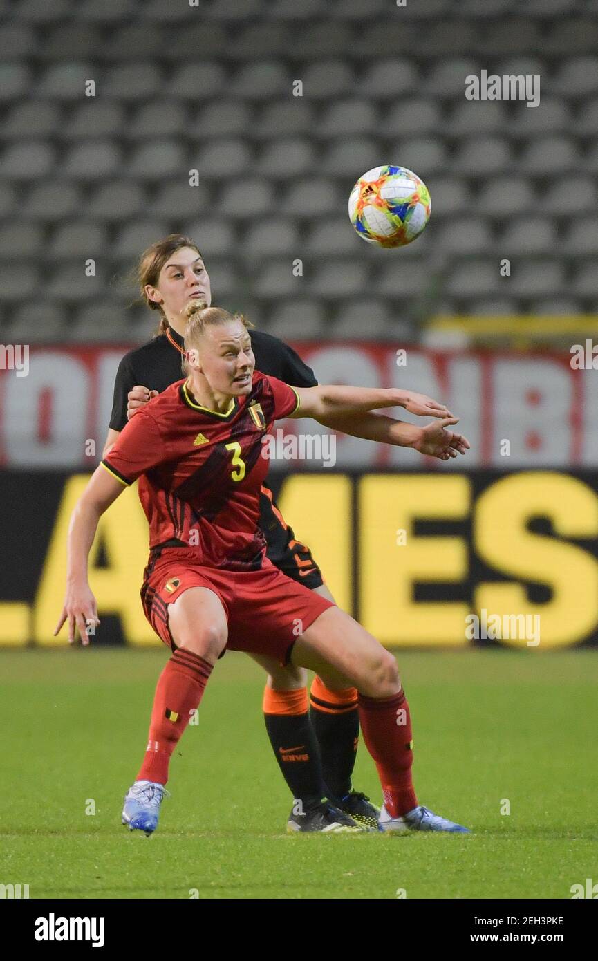 Ella Van Kerkhoven (3) of Belgium and Aniek Nouwen (2) of The Netherlands pictured during a friendly female soccer game between the national teams of Belgium, called the Red Flames and The Netherlands, called the Oranje Leeuwinnen in a pre - bid tournament called Three Nations One Goal with the national teams from Belgium, The Netherlands and Germany towards a bid for the hosting of the 2027 FIFA Women's World Cup, on Thursday 18 th of February 2021 in Brussels, Belgium . PHOTO SPORTPIX.BE | SPP | DIRK VUYLSTEKE Stock Photo