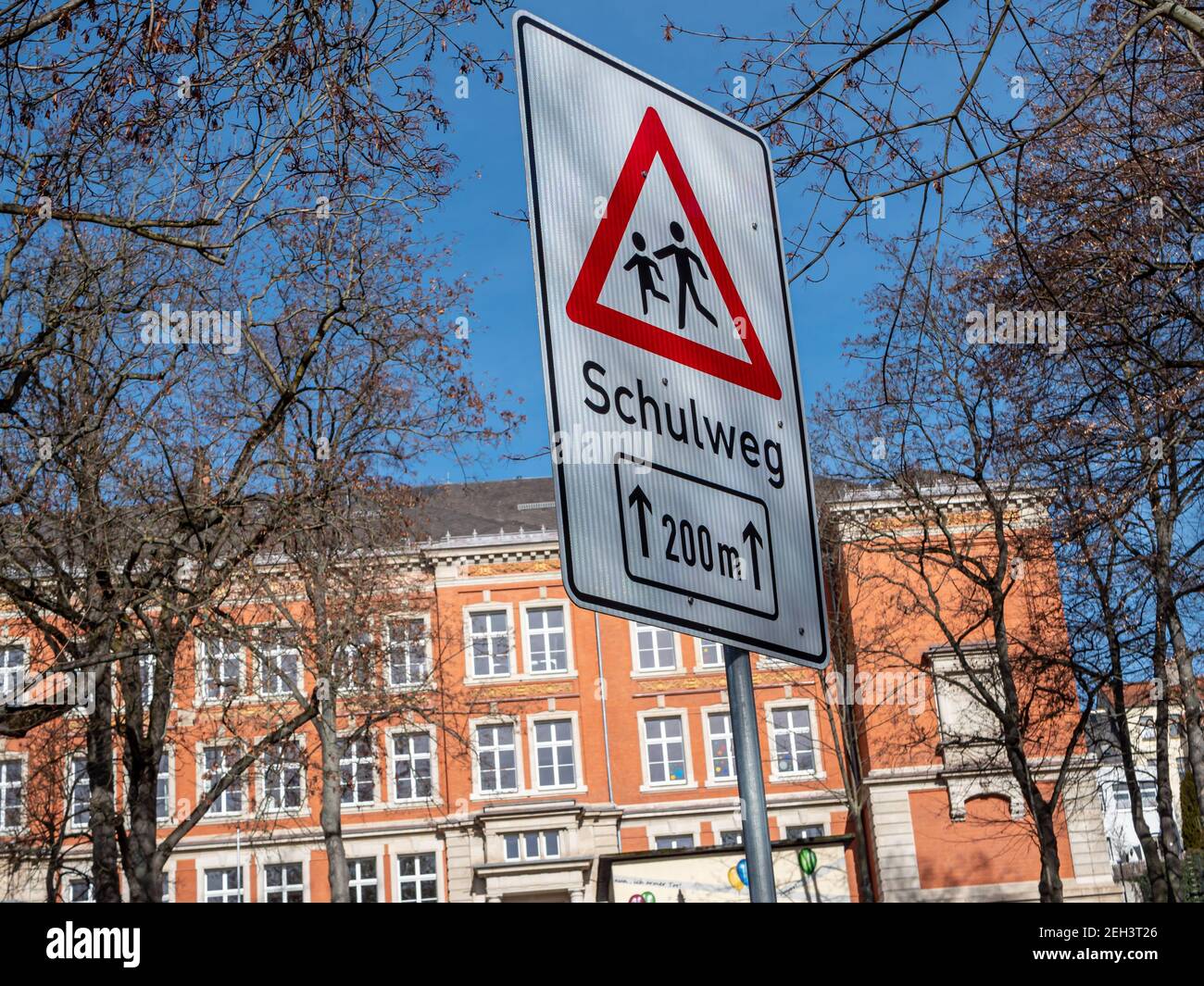 Warning sign on the way to school in Germany Stock Photo