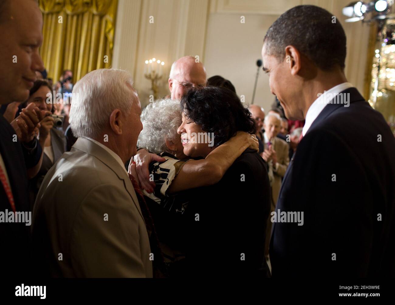 Aug. 12, 2009 “The President had just paid tribute in an East Room reception to Supreme Court Justice Sonia Sotomayor, who had just been sworn-in. As they left the stage, Justice Sotomayor hugged her mother who was sitting in the front row.” Stock Photo