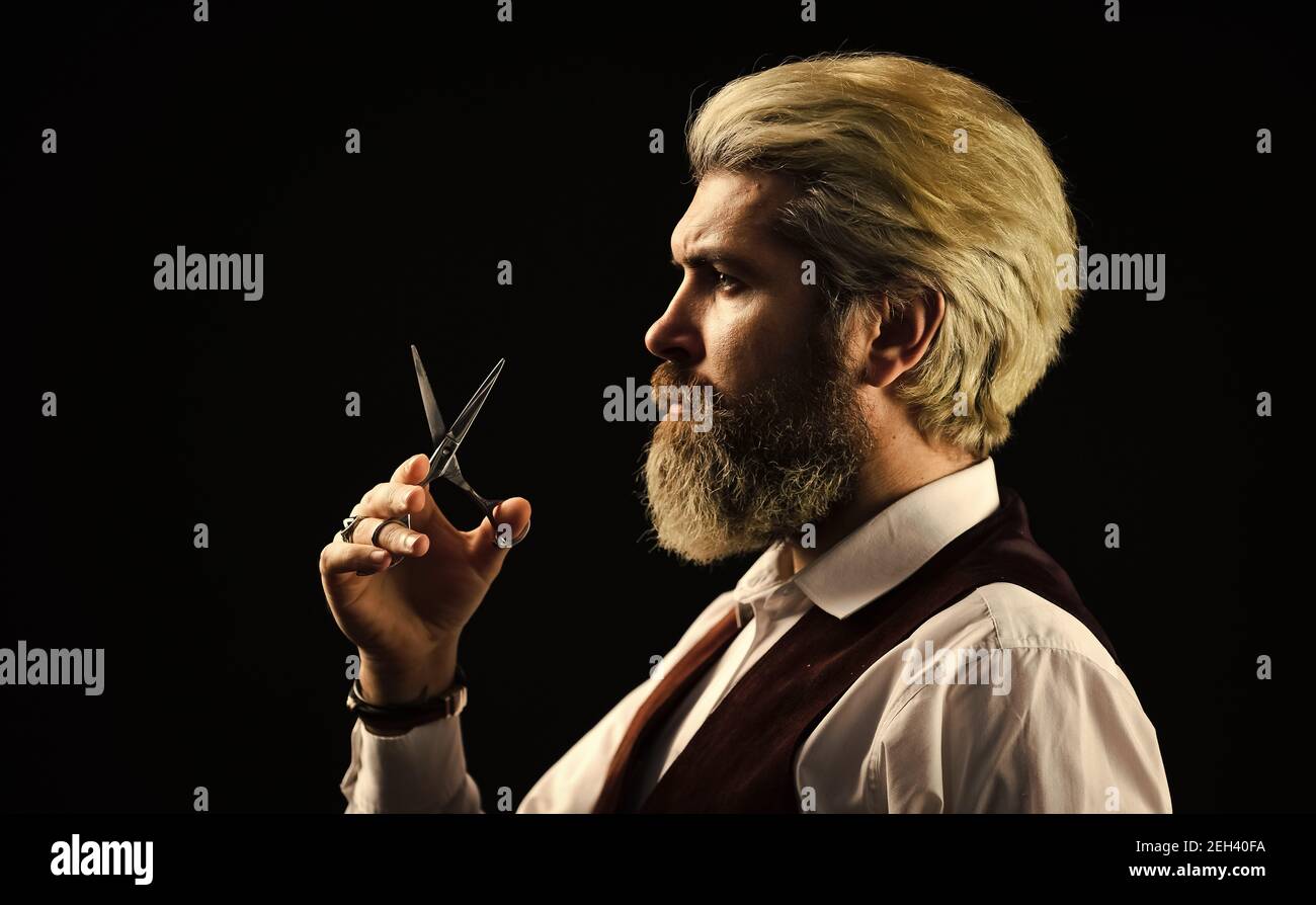 Professional Barber Ready To Do A Trendy Haircut. Mens haircut in