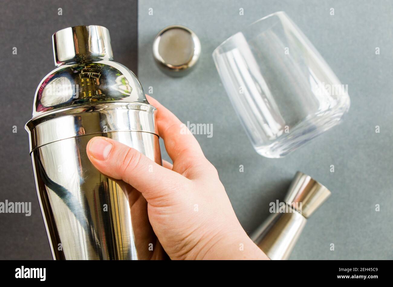 Barmen mixer and shaker, metal accessory, drink mixer on the gray background Stock Photo