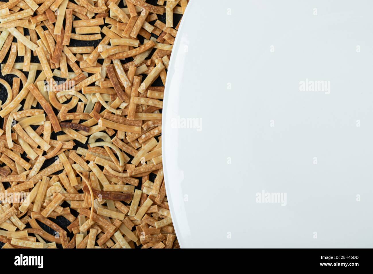 Top view of paddy rice and rice seed on dark wooden floor Stock Photo ...