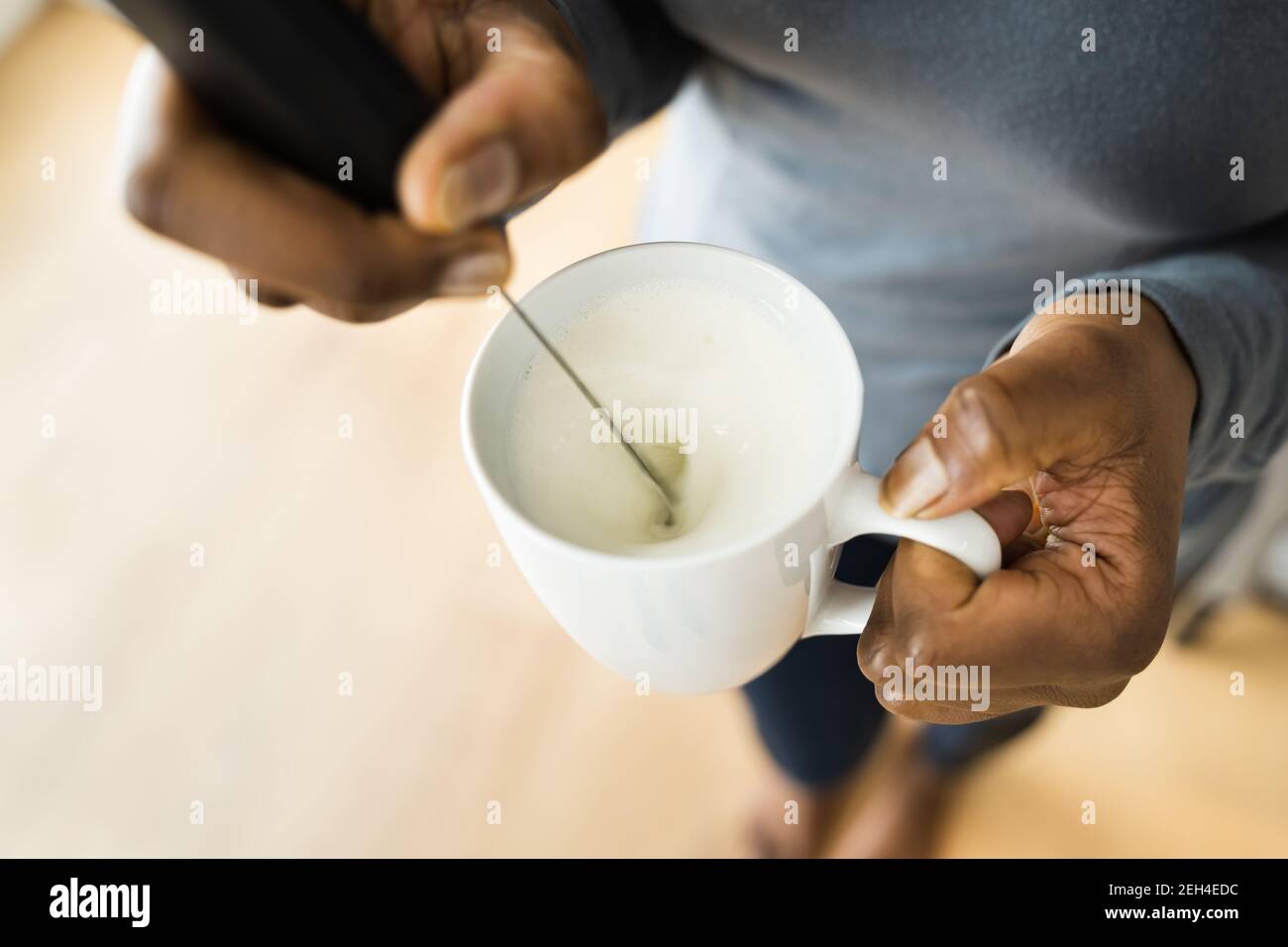 African Woman Using Milk Foamer Tool For Coffee Stock Photo Alamy