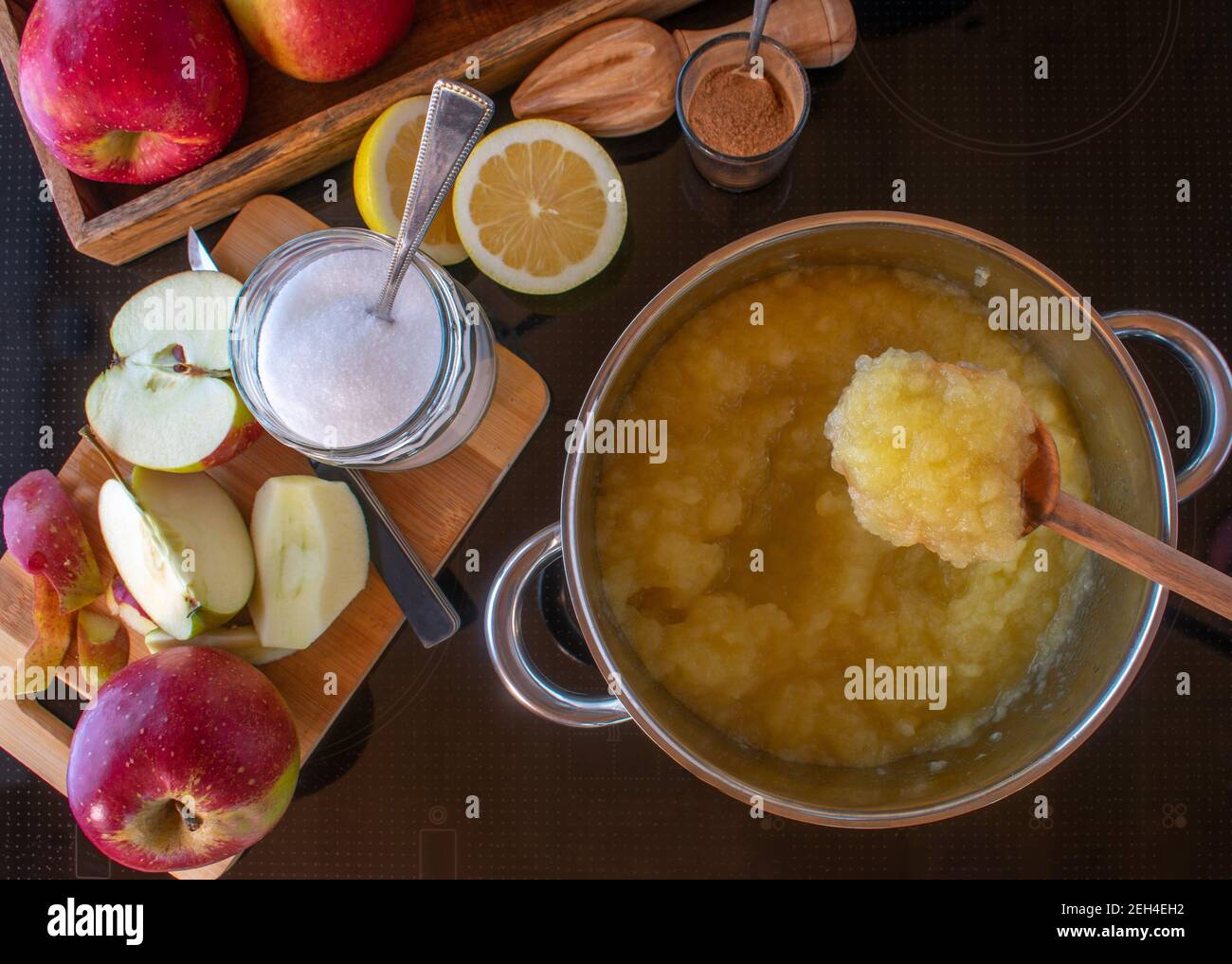 Preparation of apple sauce - Cooking apple compote at home on a stove Stock Photo