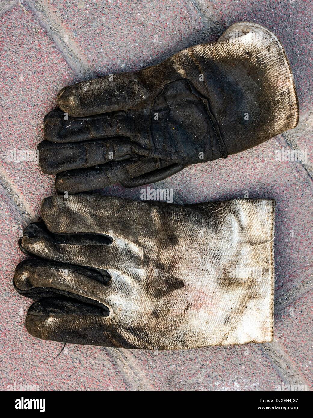 Stained and grimy work gloves Stock Photo