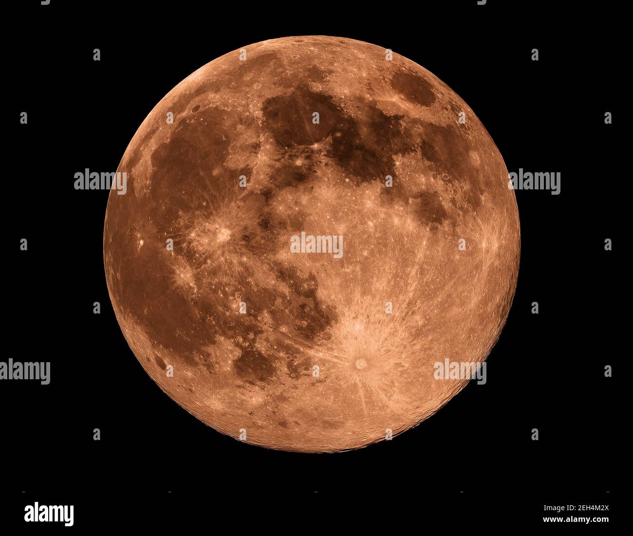 Full Moon with crater detail against black background. Stock Photo