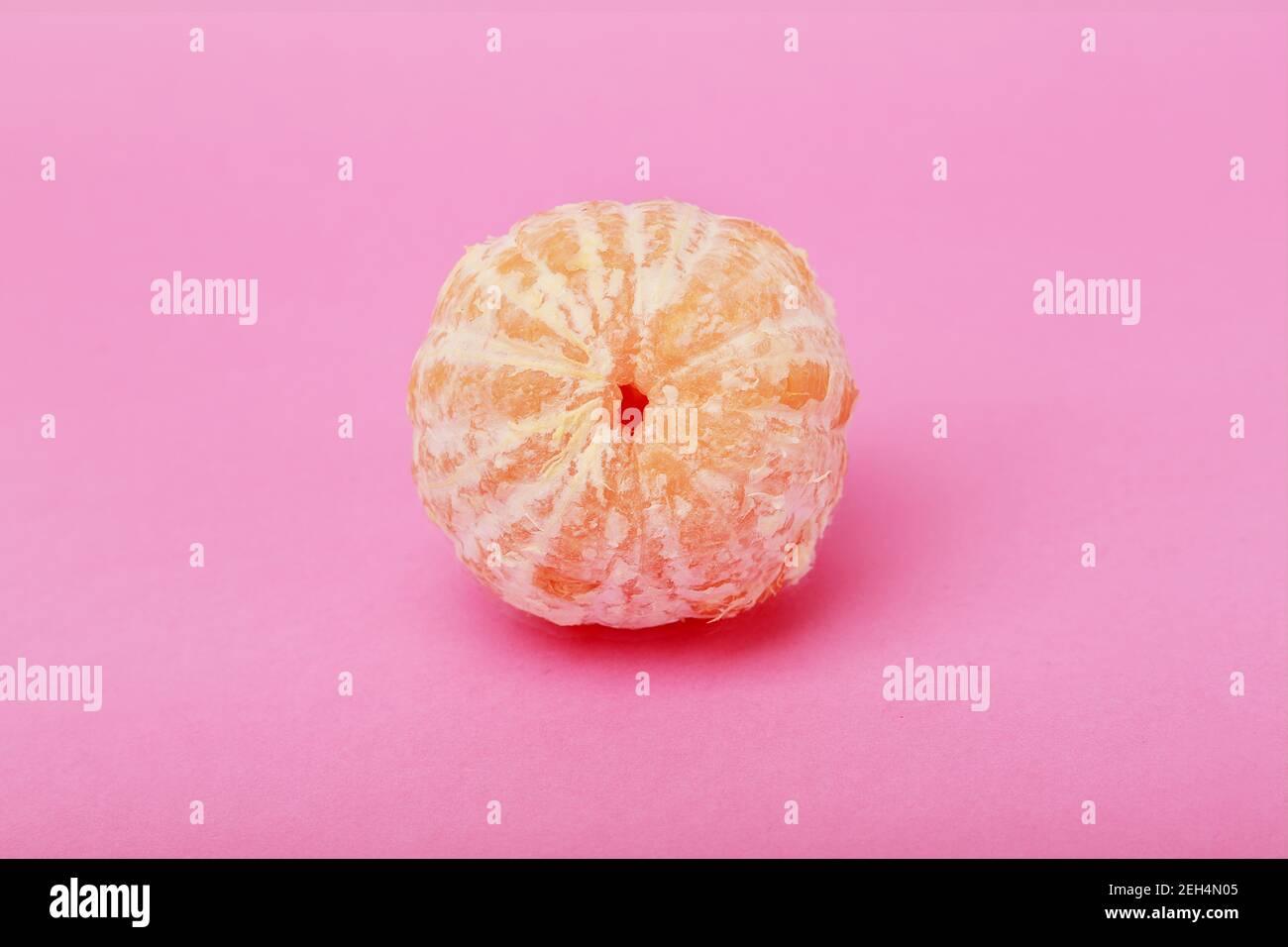 complete orange without skin on a pink orange Stock Photo Alamy