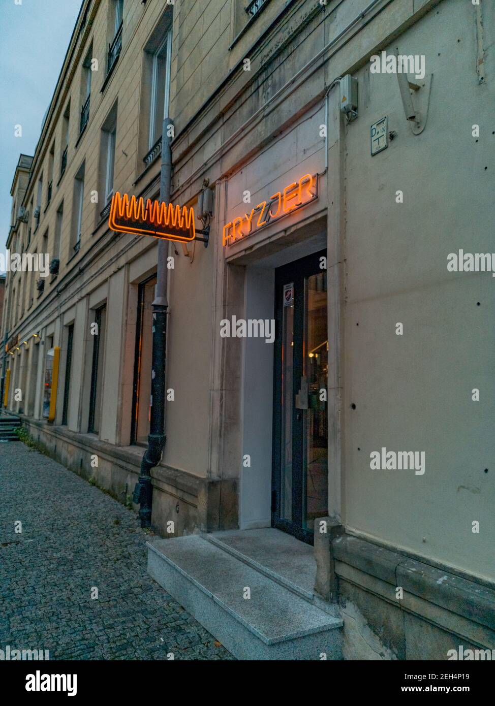 Warsaw November 9 2019 Glowing color neon of hairdressing salon Stock Photo