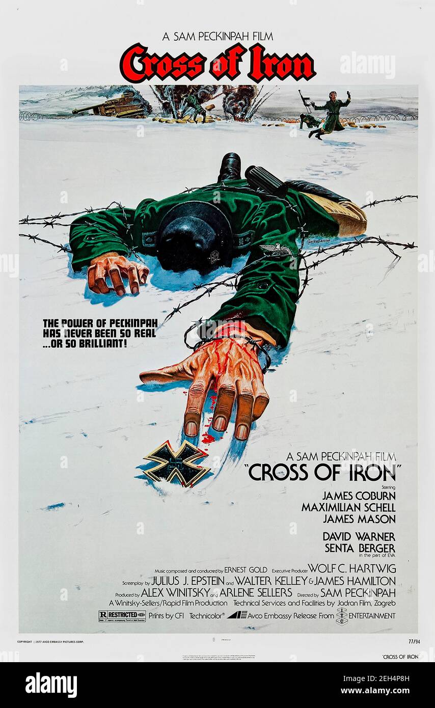 Cross of Iron (1977) directed by Sam Peckinpah and starring James Coburn, Maximilian Schell and James Mason. Violent anti-war classic about a German commander attempts to unjustly be awarded a medal and places a squad in extreme danger to cover up his fraud. Stock Photo