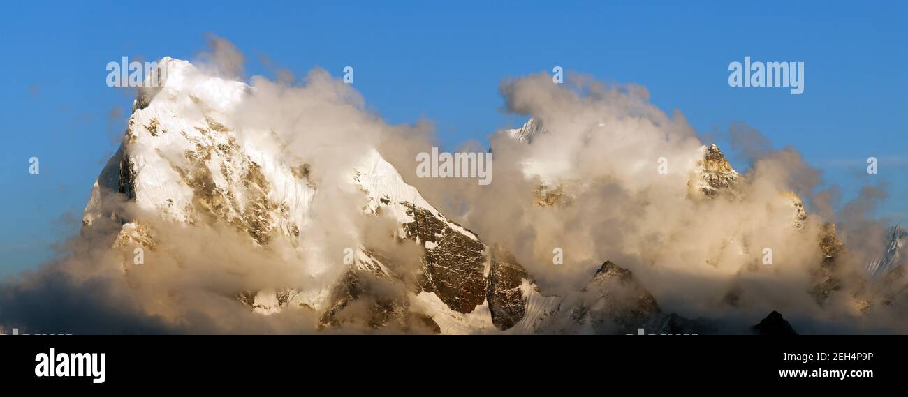 Evening view from Gokyo Ri to Arakam Tse, Cholatse and Tabuche Peak - trek to Everest base camp - Nepal Stock Photo