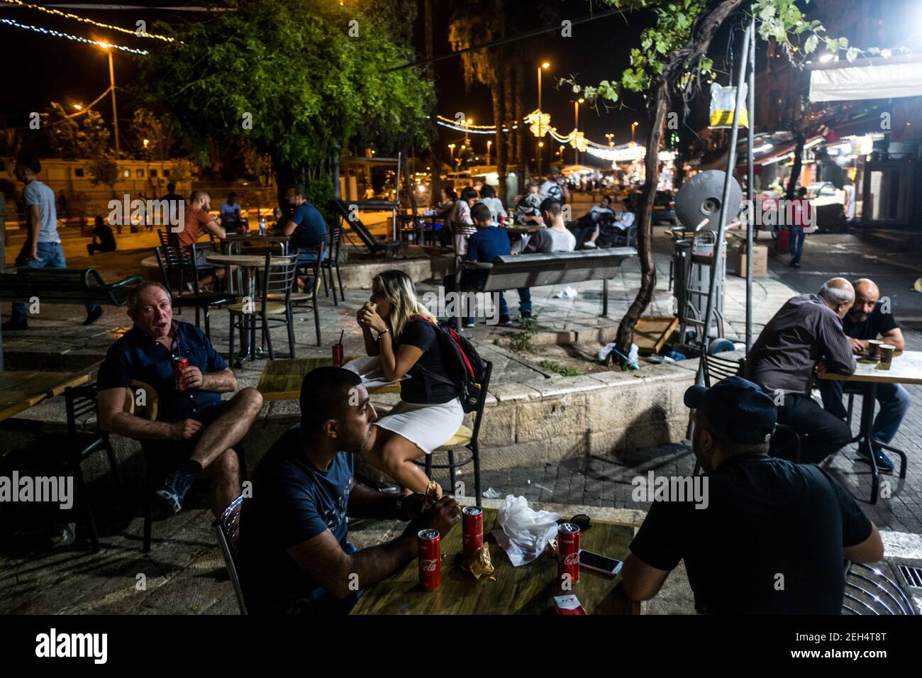 Terrace of a restaurant near the Damascus Gate. Closed during the day during Ramadan, so it is open late at night. May 19, 2018. Jerusalem. Israel. Stock Photo
