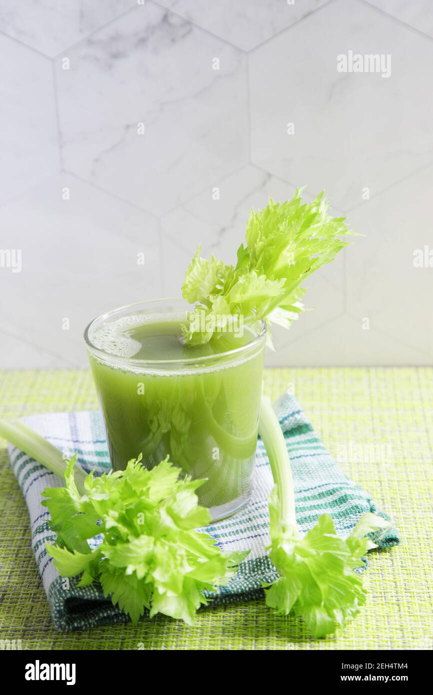 A glass of healthy celery juice Stock Photo Alamy